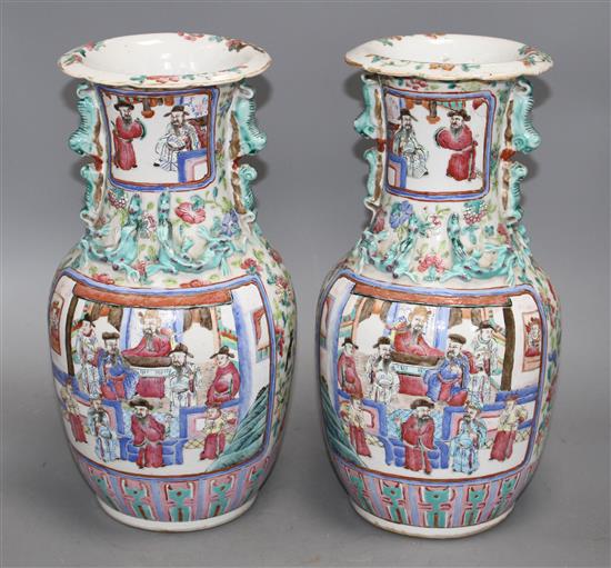 A pair of 19th century Chinese enamelled porcelain vases, height 34cm